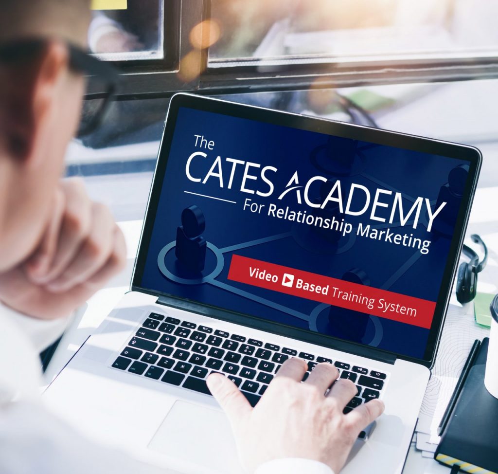 Laptop with Cates Academy logo
